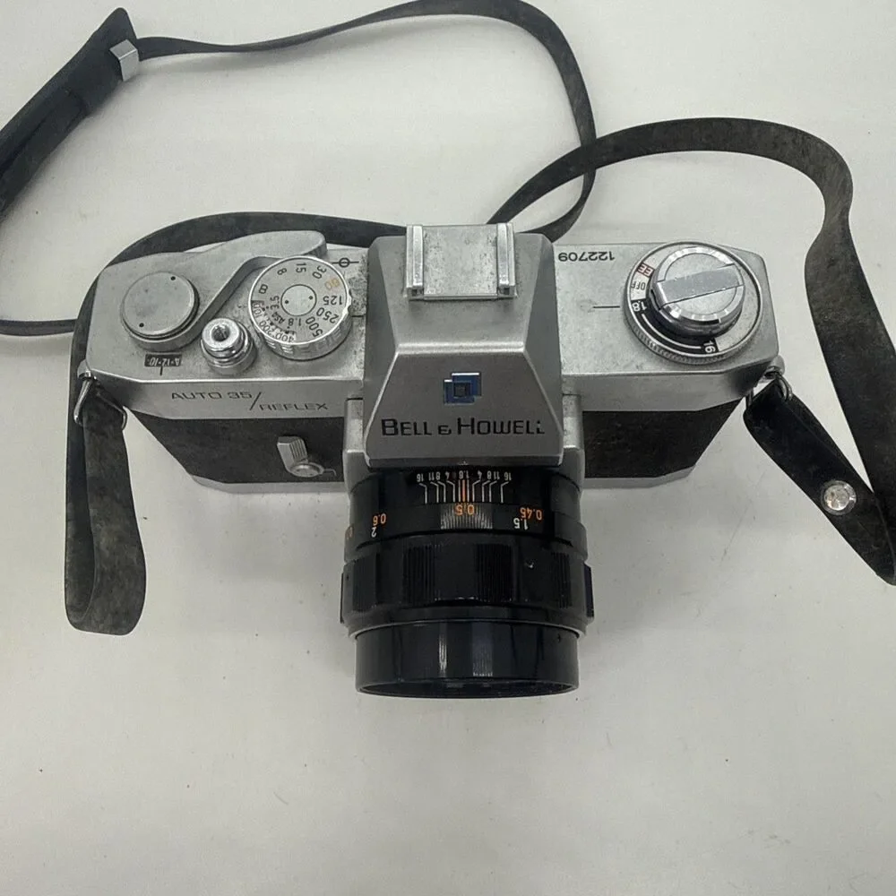 Bell & Howell 35mm Auto 35 Reflex SLR design 237 With vintage case- Working